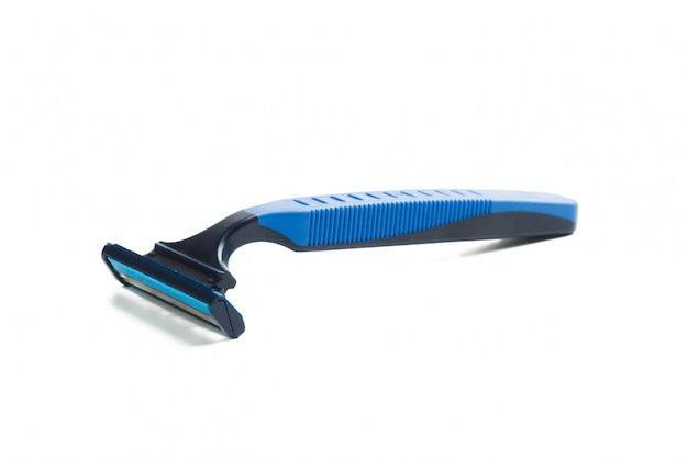 Disposable plastic shaving razor on white 