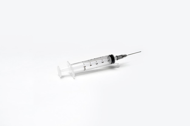 Disposable plastic syringe isolated on white. Syringes placed on a white background.