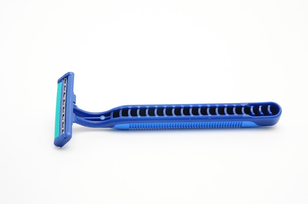 Photo disposable razor on an isolated white background