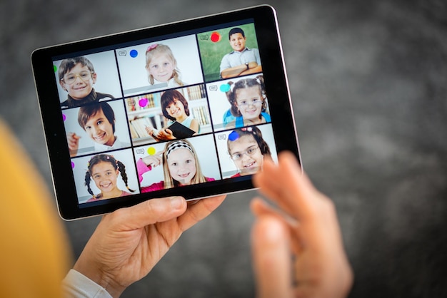 Distance learning school children online on screen