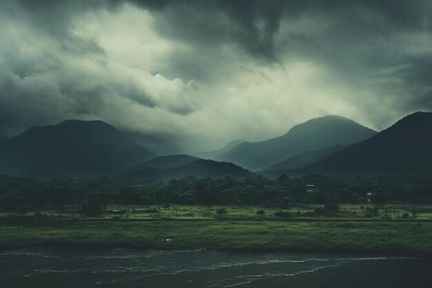 Photo distant mountains partially obscured by louds