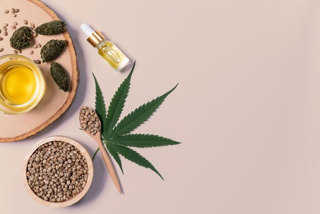 Distillation concept of CBD oil feature with hemp seeds on the white background