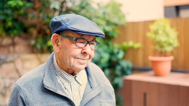 Distracted grandfather looking away in a nursing home