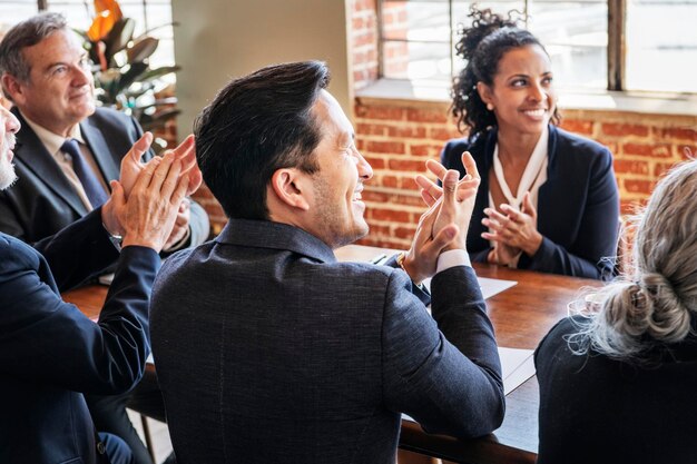 Diverse business people applauding with joy