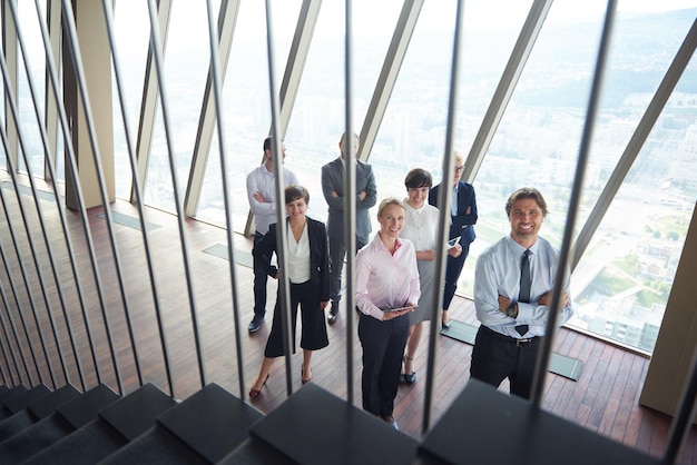 diverse business people group standing together as team  in modern bright office interior