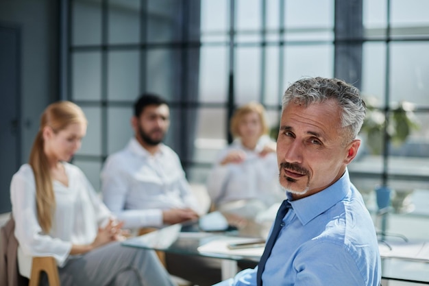 Diverse business people partners group negotiating at boardroom meeting