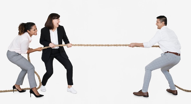 Diverse business people tugging on a rope