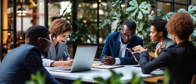 Photo diverse business people using tablet and laptop