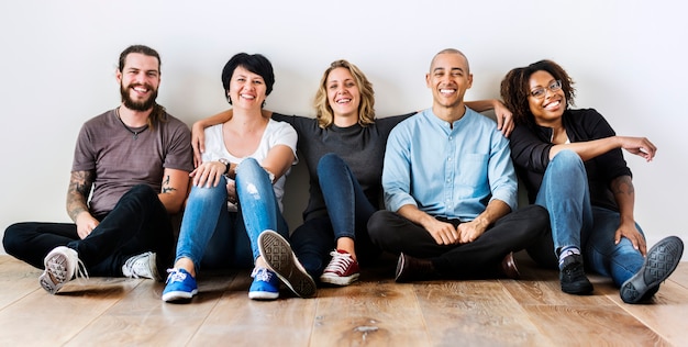 Diverse friends sitting together