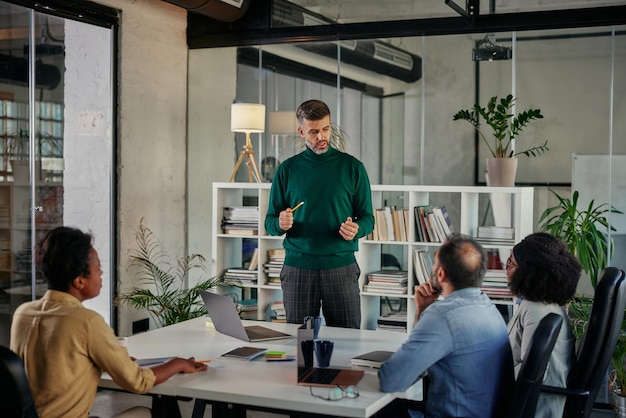 Diverse group of businesspeople having a meeting in the office