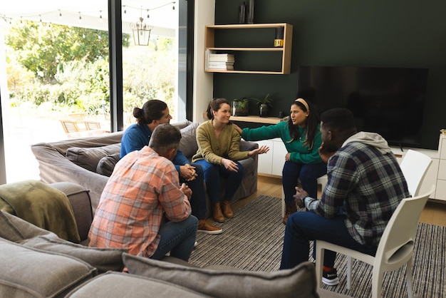 Diverse group of friends talking and supporting each other on therapy session