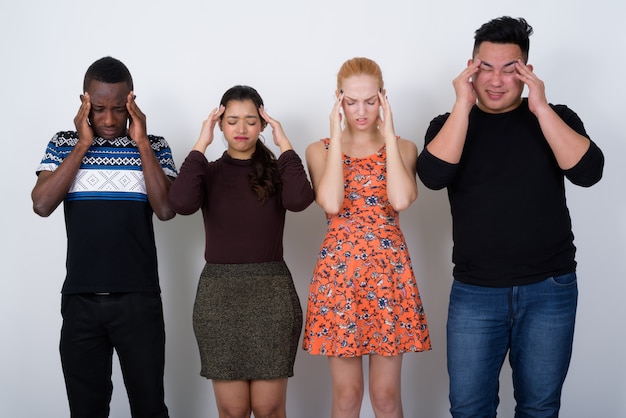 diverse group of multi ethnic friends looking strressed