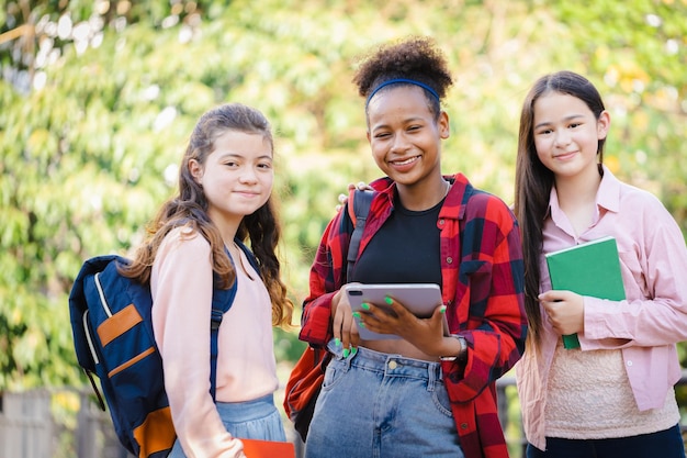 Diverse group of students on college campus enjoying campus life