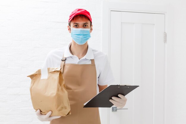 Diverse of paper containers for takeaway food. Delivery man is carrying