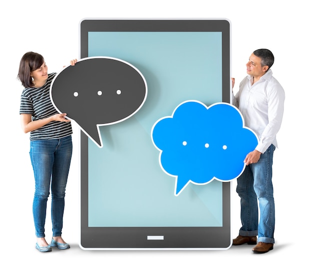 Photo diverse people holding speech bubbles and tablet