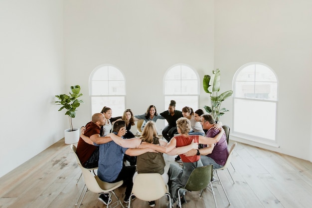 Diverse people in a support group session