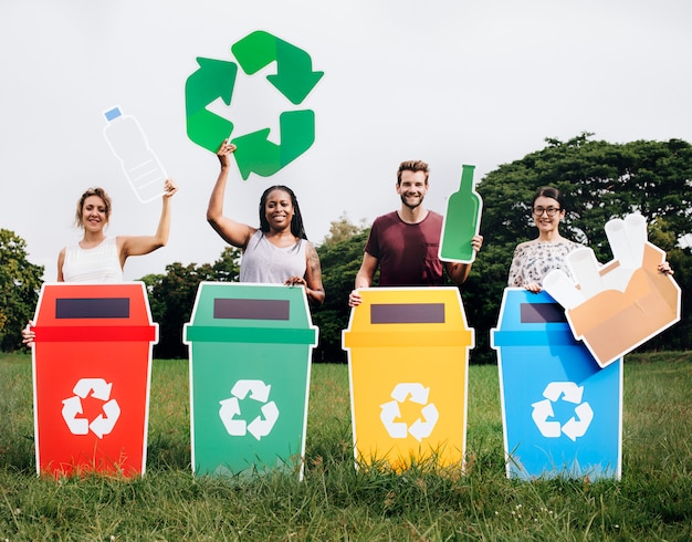 Diverse people with colorful recycle bins