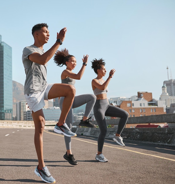 diversity fitness friends or runner stretching in city for marathon running exercise or sports workout wellness teamwork health or group of athlete training for warm up sport or street race