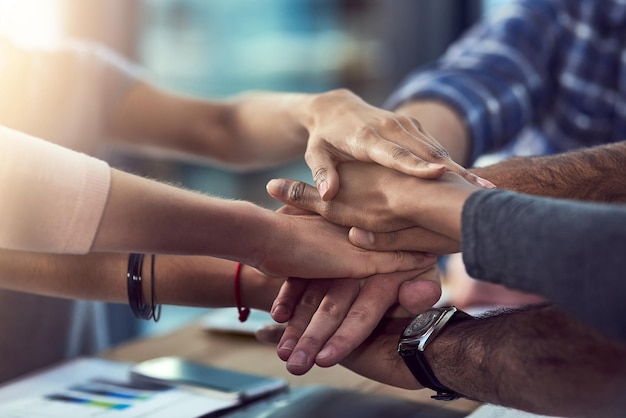 Diversity teamwork and hands together in office for corporate support company collaboration and planning Business people trust and solidarity in circle for community workshop and celebration