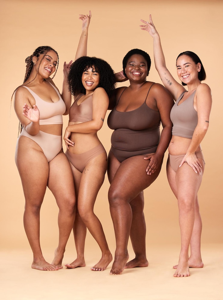 Photo diversity women celebration and body portrait of friends group together for inclusion beauty and power underwear model people on beige background with cellulite pride and motivation for self love