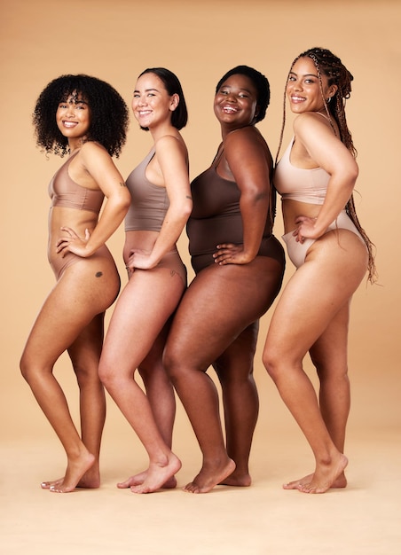 Diversity women skin and body positivity portrait of friends together for inclusion beauty and power underwear model group on beige background with cellulite pride and motivation for self love