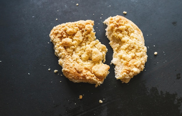 divided streusel bun or roll on old table