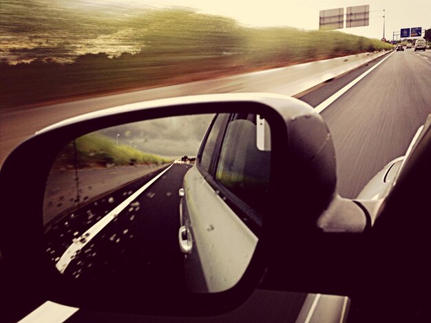 Photo dividing line reflecting in rear view mirror