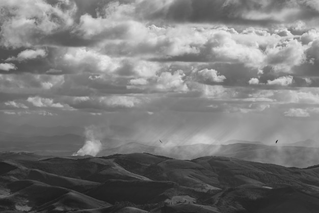 Divine light shining over the vast mountainous fields of the dazzling Ibitipoca State Park, Minas Gerais, Brazil