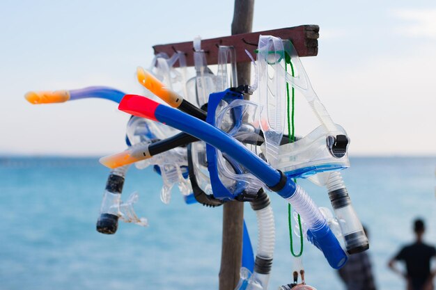 Diving Mask and Snorkel on blue sea background