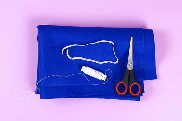 Diy blue felt sleep mask with white thread embroidered