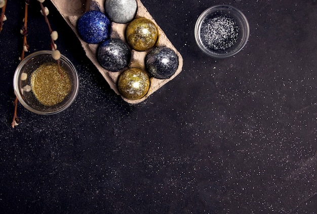 DIY Easter. Eggs decorated with sequins. Copy space.