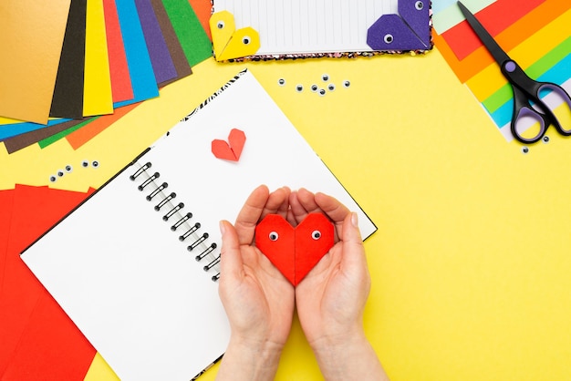 DIY instruction. Step by step guide. The process of making a bookmark for a book in the form of a heart for Valentine's Day.