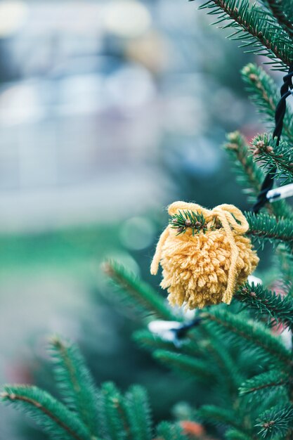 DIY yarn decoration on a Christmas tree