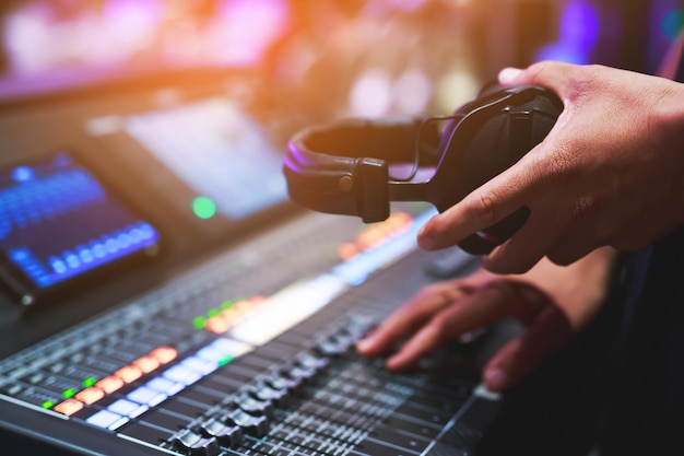 DJ mixing music on stage, concert