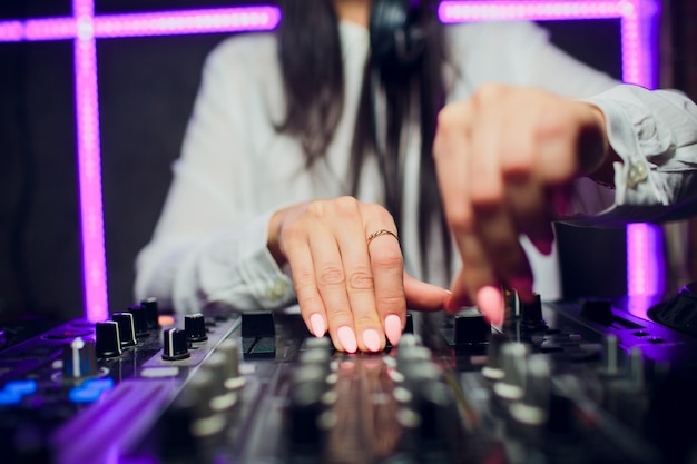 DJ playing music mixer closeup