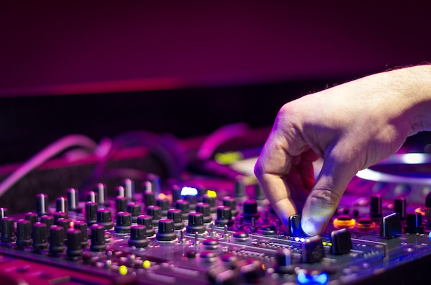 DJ playing music at mixer