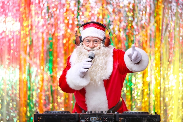 DJ Santa Claus playing music in club