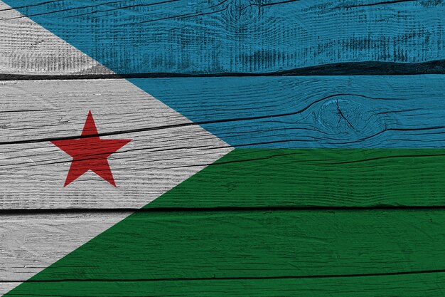 Djibouti flag painted on old wood plank