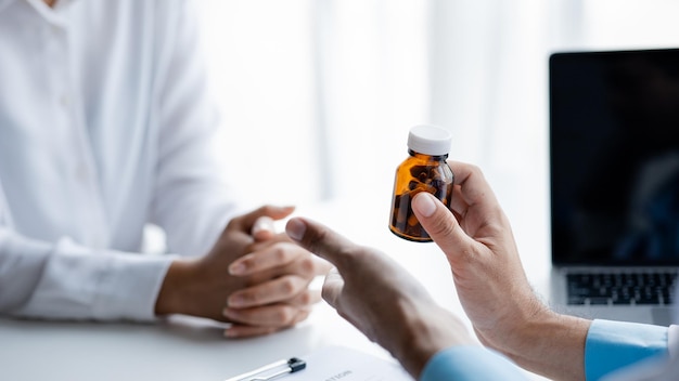 Doctor are recommending medicines to patients after being examined and diagnosed by the patient's doctor the concept of treatment and symptomatic medication dispensing by the pharmacist