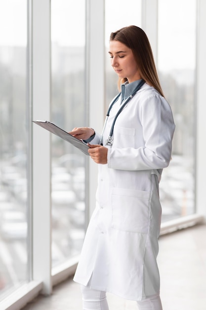 Photo doctor checking medical subscription