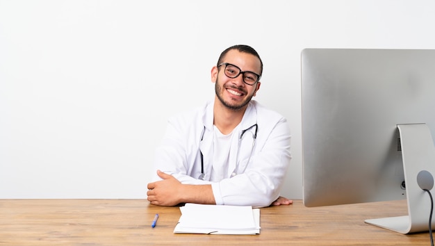 Doctor Colombian man with glasses and smiling