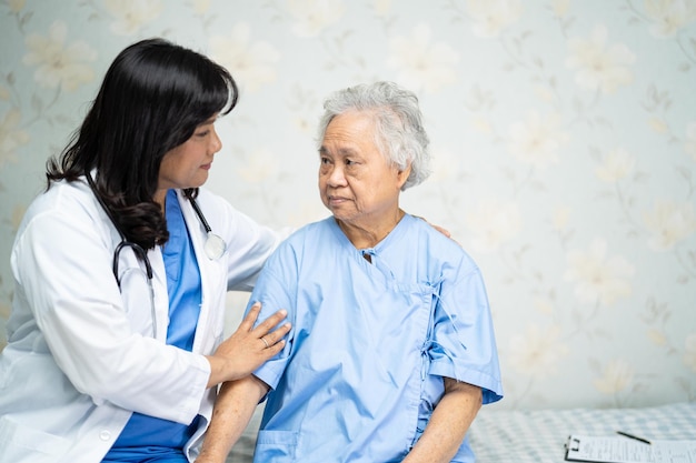 Doctor consoling patient at hospital
