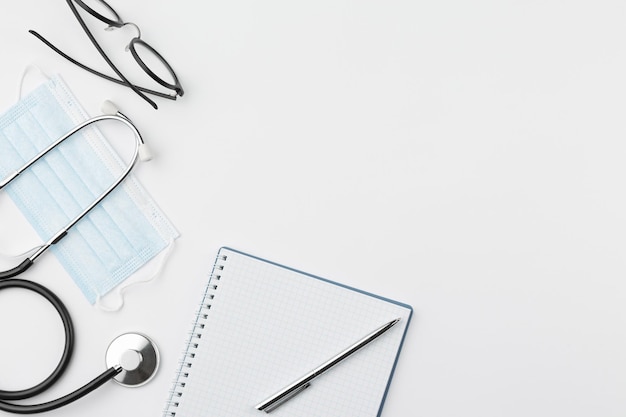 Doctor desk with stethoscope and stationery