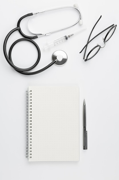 Doctor desk with stethoscope and stationery