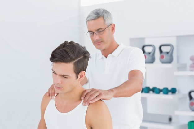 Doctor doing back adjustment