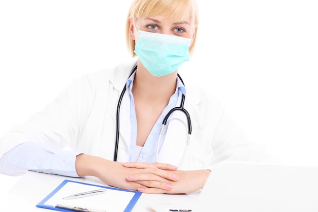 doctor doing paperwork over white background