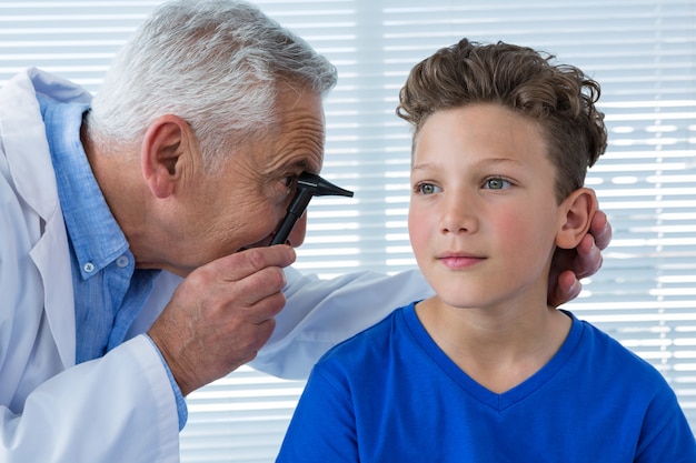 Doctor examine patient ear