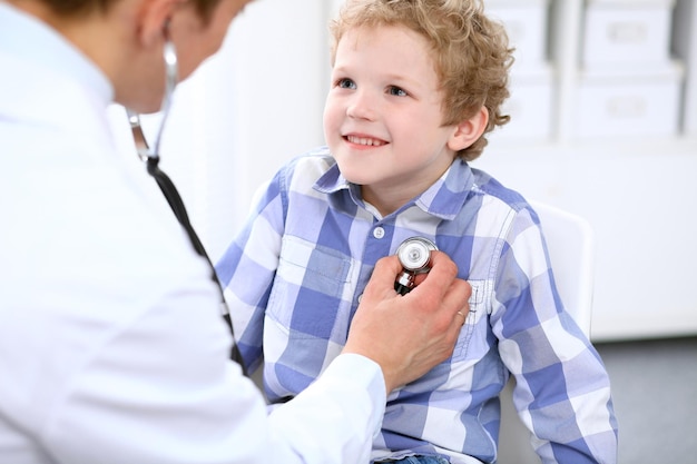 Doctor examining a child  patient by stethoscope