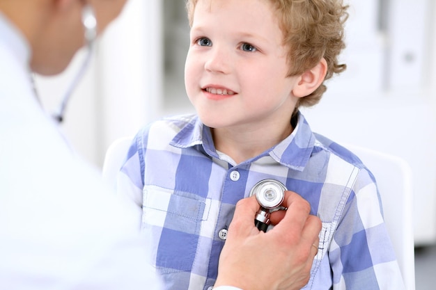 Doctor examining a child  patient by stethoscope