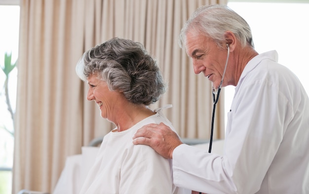 Doctor examining his  patient